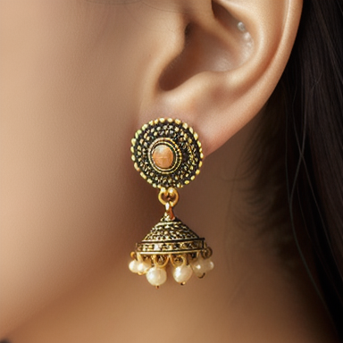 Ancient earrings depicting cultural significance and craftsmanship